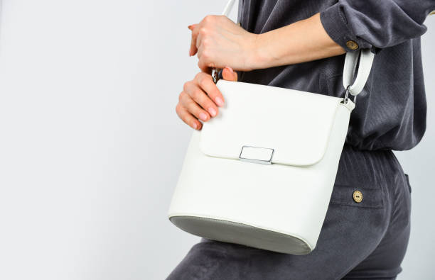 woman looking stylish with a bucket bag